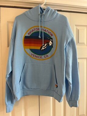 Aviator Nation Light Blue Hoodie with Sunset Tag Graphic